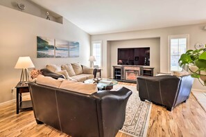 TV, fireplace, books