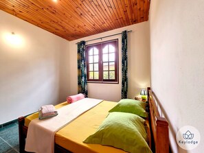 2 dormitorios, tabla de planchar con plancha, wifi gratis y ropa de cama