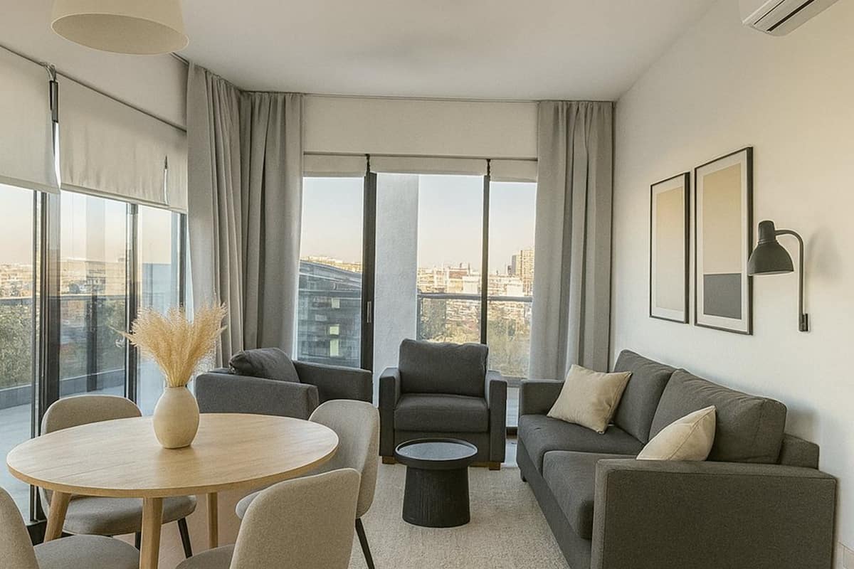Deluxe Apartment, 2 Bedrooms, Jetted Tub, City View | Living area | 40-inch Smart TV with cable channels, Netflix, pay films