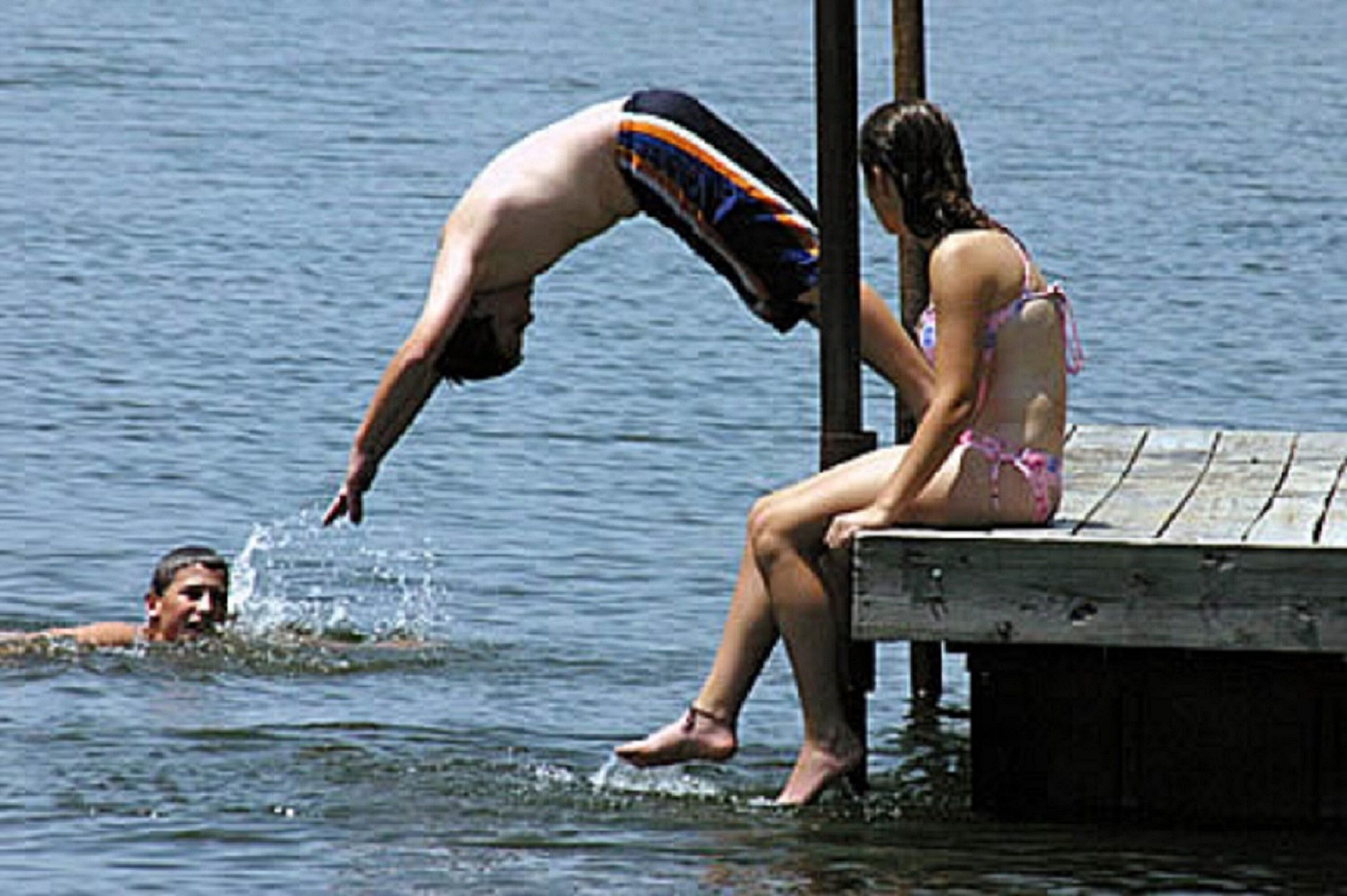 A wooden dock extending into a body of water.