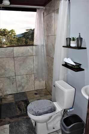 Sunrise Arenal Volcano View | Bathroom | Shower, towels, soap, shampoo