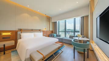 Premium bedding, down duvets, pillow-top beds, in-room safe