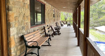Great lodging for Penn State events and view of Lake Louise at Camp Golden Pond.