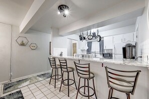 Condo, Multiple Beds, Patio, Garden View (Westfield Wonder) | Private kitchen | Fridge, microwave, oven, stovetop - Centrally Located in Historic Tarrytown (Austin)