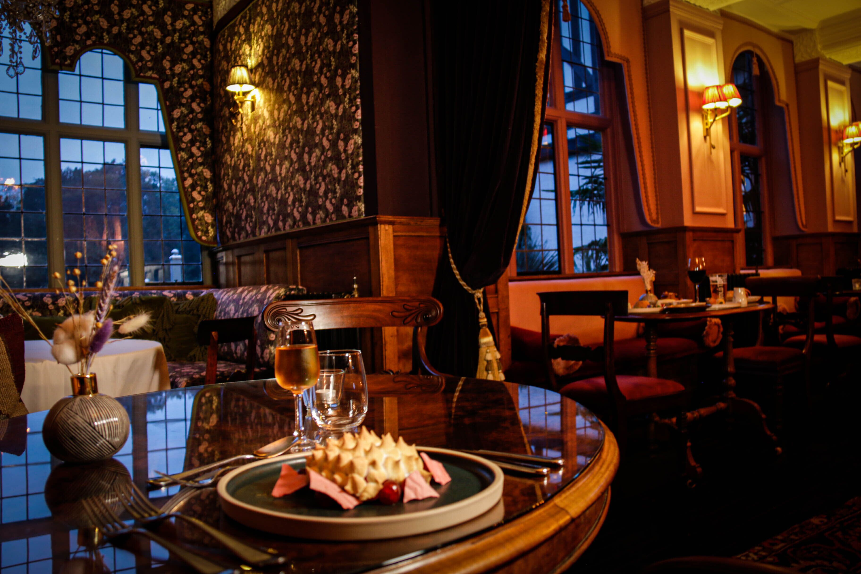 Lunch, dinner served; local cuisine, garden views 