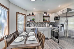 Fridge, microwave, stovetop, dishwasher - Deck + Fenced Yard: Capitol Hill Townhome (Denver)