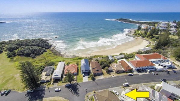 Enjoy access to the beach from this coastal residential area, with a variety of homes and a convenient road leading to the shore.