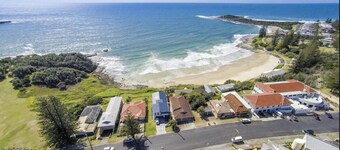 Pet friendly, 2 bedroom unit on top of the hill near the Pacific Hotel which is located right across