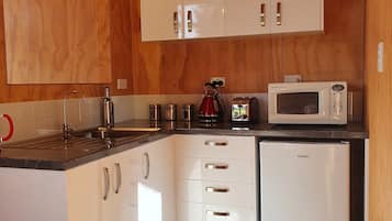 Fridge, microwave, coffee/tea maker, electric kettle