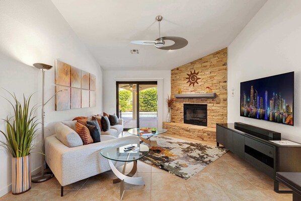 House, Multiple Beds, Pool Access, Mountain View (Casa de Arcos) | Living area | 50-inch flat-screen TV with digital channels, fireplace - Casa de Arcos - Private Hot Tub (Palm Springs)