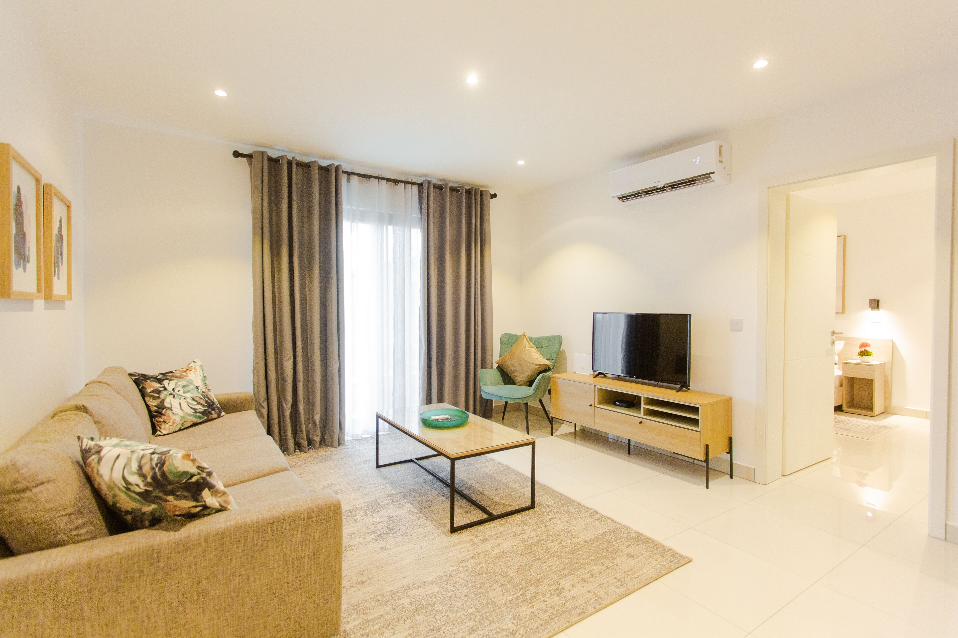 Premier Apartment, 1 Bedroom | Living room | 42-inch flat-screen TV with cable channels, TV, Netflix