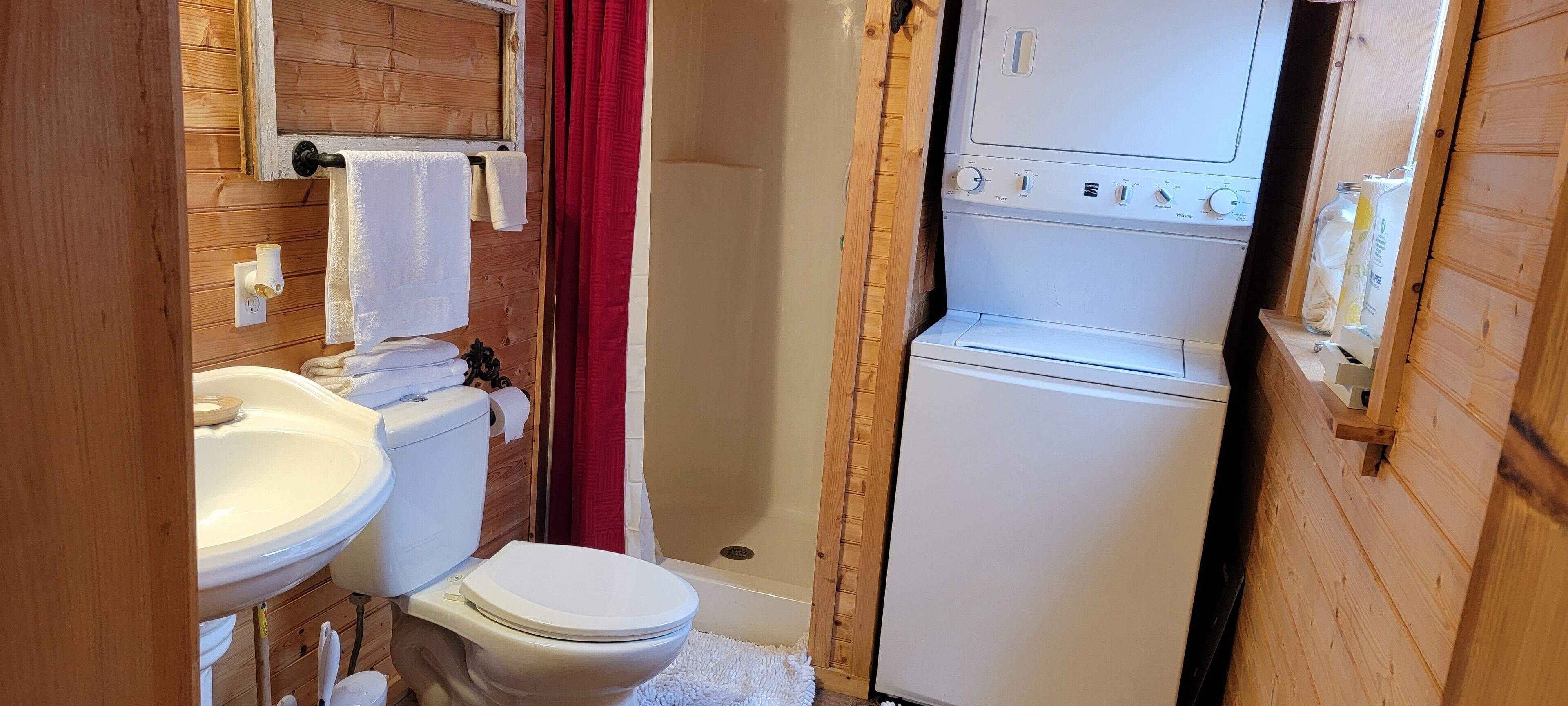 Shower, towels, soap, toilet paper