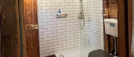 Apartment | Bathroom | Shower, deep soaking tub, hair dryer, towels
