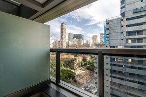 A high-rise building with a view of a cityscape through a window. - Rep1204 Setin Downtown Rep Blica (São Paulo)
