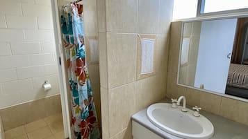 Shower, hair dryer, towels