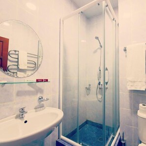 Shower, free toiletries, hair dryer, slippers
