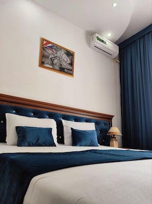 Premium bedding, down duvets, in-room safe, desk