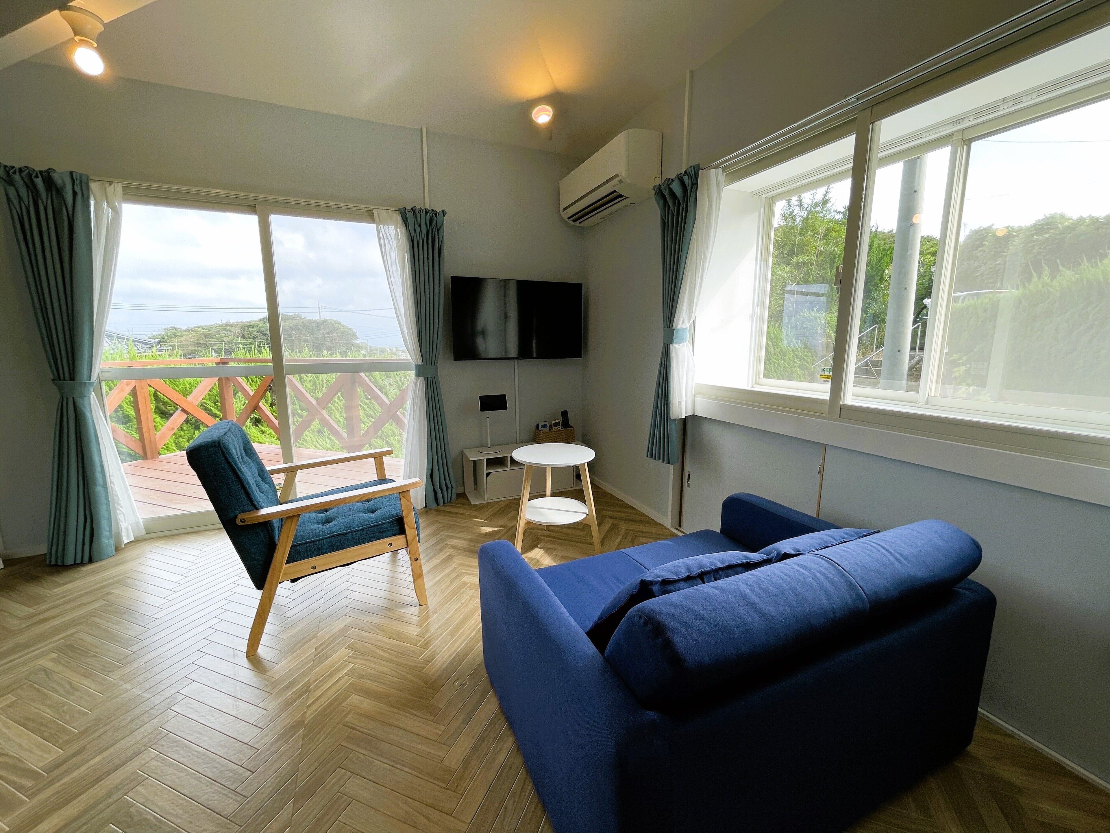 Basic Villa | Living area | Flat-screen TV