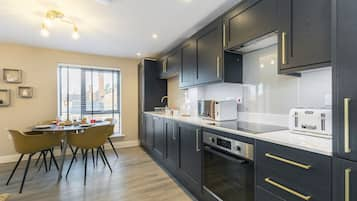 Apartment | Private kitchen | Full-size fridge, microwave, oven, stovetop