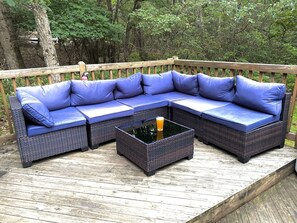 Terrace/patio - Unleash the adventurer in you with the ultimate Pocono Mountains escape nestled in the Northridge at Camelback community 1 Mile from Camelback.<br>⁕Outdoor hot tub <br>⁕Screened-in porch with firepit<br>⁕Indoor fireplace<br>⁕Dog-friendly<br>⁕1 mile t (Tannersville)