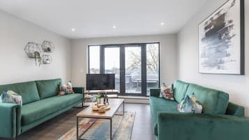 Apartamento | Área de estar | Smart TV 43 polegadas com canais digitais, TV, Netflix