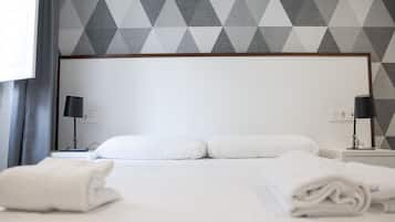 Coffres-forts dans les chambres, fer et planche à repasser