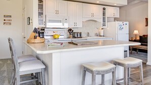 Coffee/tea maker, fridge, microwave, oven