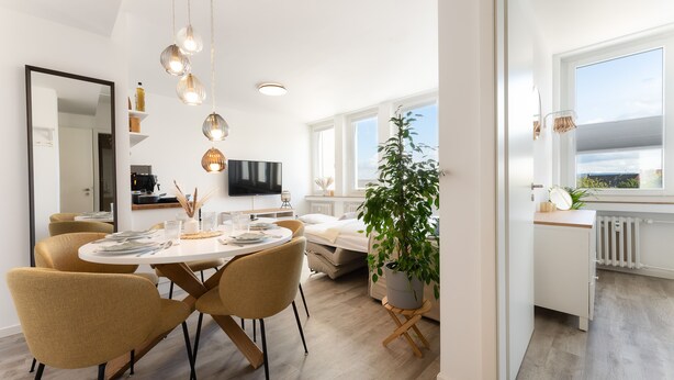Familieleilighet | Oppholdsområde | En 50-tommers smart-TV med digitale kanaler samt TV og Netflix