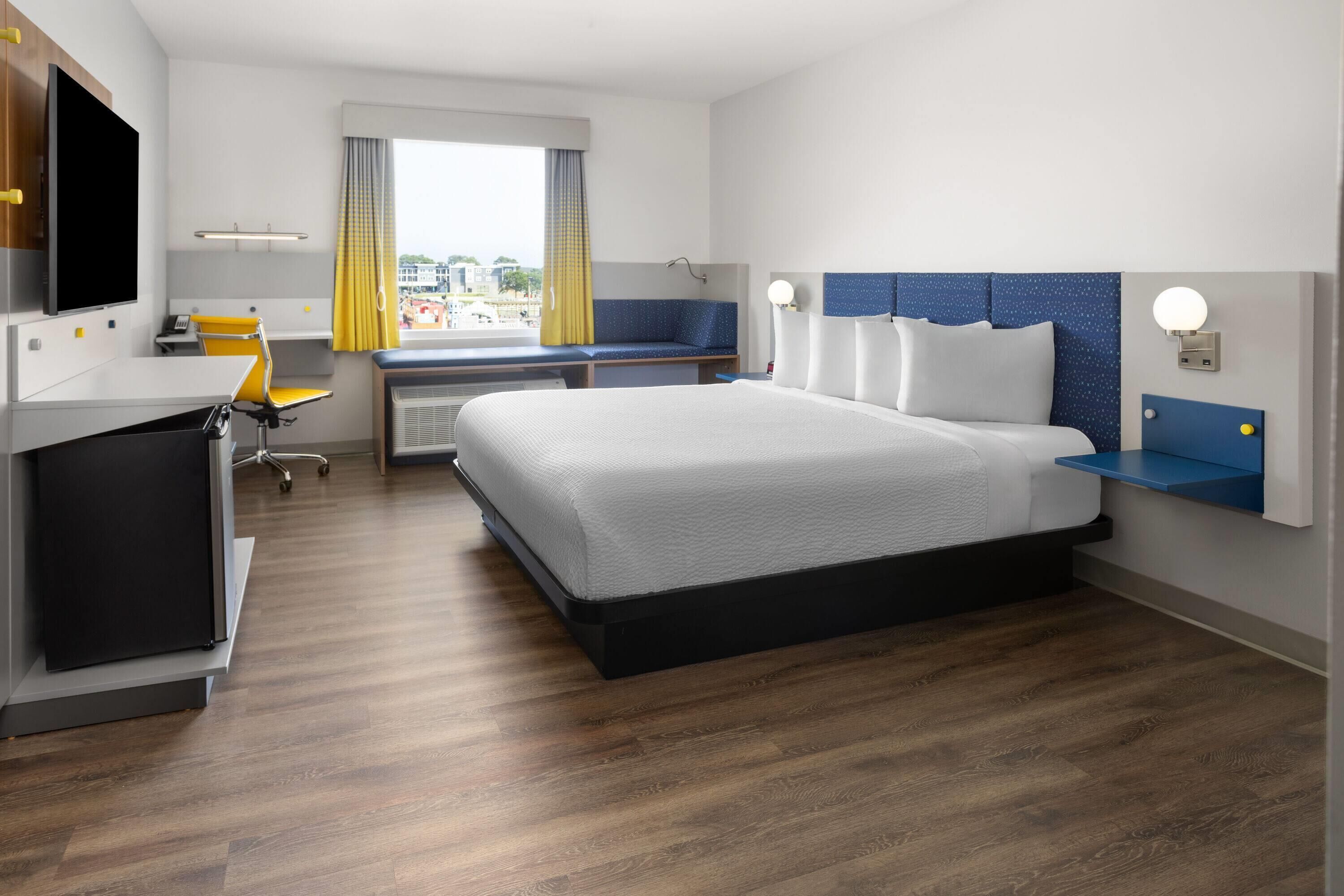 Suite, 1 King Bed, Accessible, Non Smoking (Mobility, Roll-In Shower) | Desk, laptop workspace, iron/ironing board, free WiFi