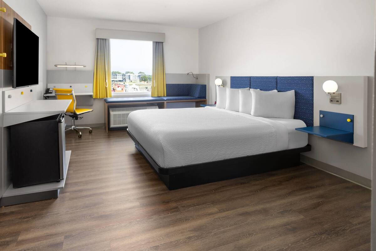 Suite, 1 King Bed, Accessible, Non Smoking (Mobility, Roll-In Shower) | Desk, laptop workspace, blackout drapes, WiFi (free)