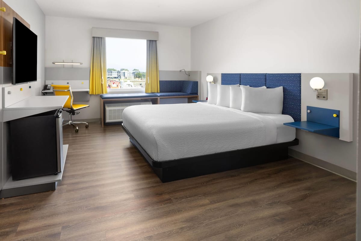 Suite, 1 King Bed, Accessible, Non Smoking (Mobility, Roll-In Shower) | Desk, laptop workspace, iron/ironing board, free WiFi