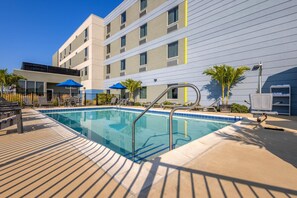 Seasonal outdoor pool, open 8:00 AM to 9:00 PM, pool umbrellas - Microtel Inn & Suites By Wyndham Rehoboth Beach (Rehoboth Beach)