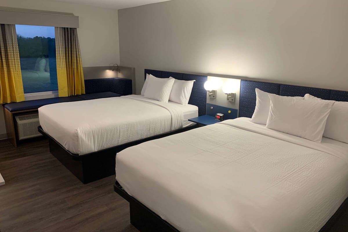Room, 2 Queen Beds, Non Smoking, Corner (Wide Bathtub) | Desk, laptop workspace, iron/ironing board, free WiFi