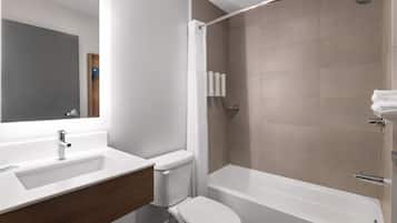 Room, 1 King Bed, Non Smoking | Bathroom | Combined shower/bathtub, free toiletries, hair dryer, towels