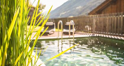 Appartement de vacances "Steinhaus XXL" avec vue sur la montagne, piscine commune et Wi-Fi