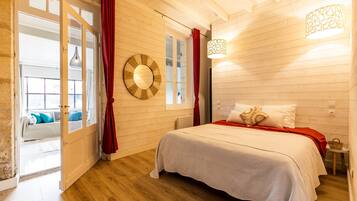 2 slaapkamers, een strijkplank/strijkijzer, gratis wifi, beddengoed