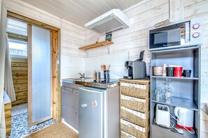 Fridge, microwave, stovetop, coffee/tea maker