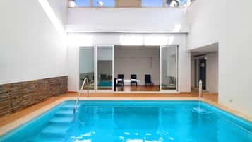 Alberca techada y alberca climatizada