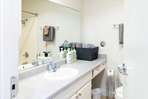 Hair dryer, towels, soap, shampoo