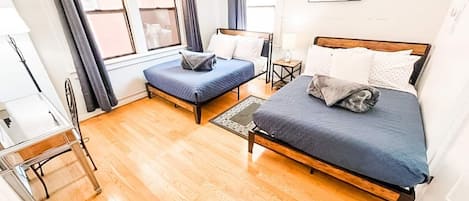 2 bedrooms, desk, iron/ironing board, travel crib