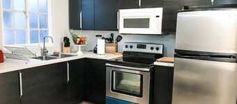 UNIT #1 2-bedroom/1-bath 500 sq. ft suite with Parking & 4 Beds including a full kitchen