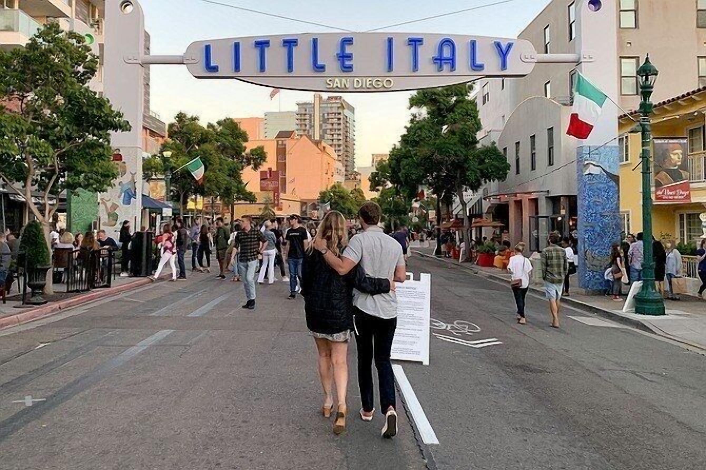 A street scene with a sign reading "LITTLE ITALY SAN DIEGO".