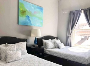 2 bedrooms, desk, iron/ironing board, travel cot - Traveling with colleagues or another couple?  We manage multiple suites in this building — message us about availability. (San Diego)