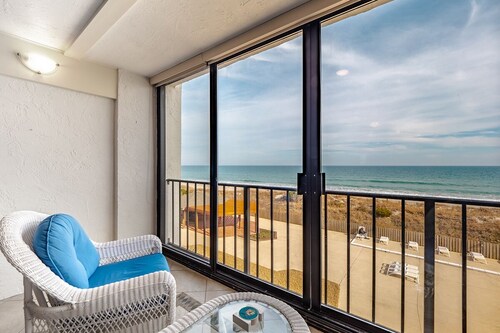 Enjoy horizon views and community pool at 2BR/2BA oceanfront condo
