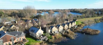 A Cotswold stone lakeside cottage that sleeps 6 guests  in 3 bedrooms