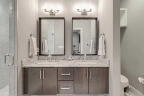 Combined shower/tub, hair dryer, towels, shampoo