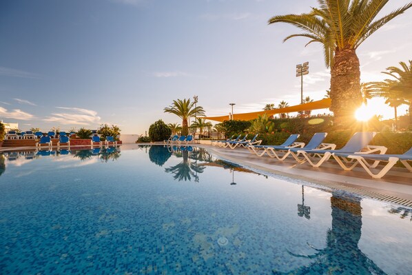 2 outdoor pools, pool umbrellas, sun loungers