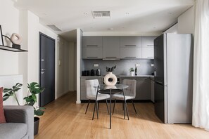 Standard Apartment | Living area | 43-inch Smart TV with digital channels, TV, Netflix - Striking 1BR Apartment in Kolonaki A (Athens)