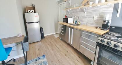 In unit laundry. AC, Modern Studio with desk and parking