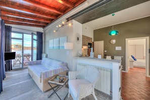 Standard Apartment, Multiple Bedrooms, Lakeside (Stella Del Lago Pied Dans L'Eau) | Living area | 21-inch TV with satellite channels - Stella Del Lago Pied Dans L'eau (Arona)